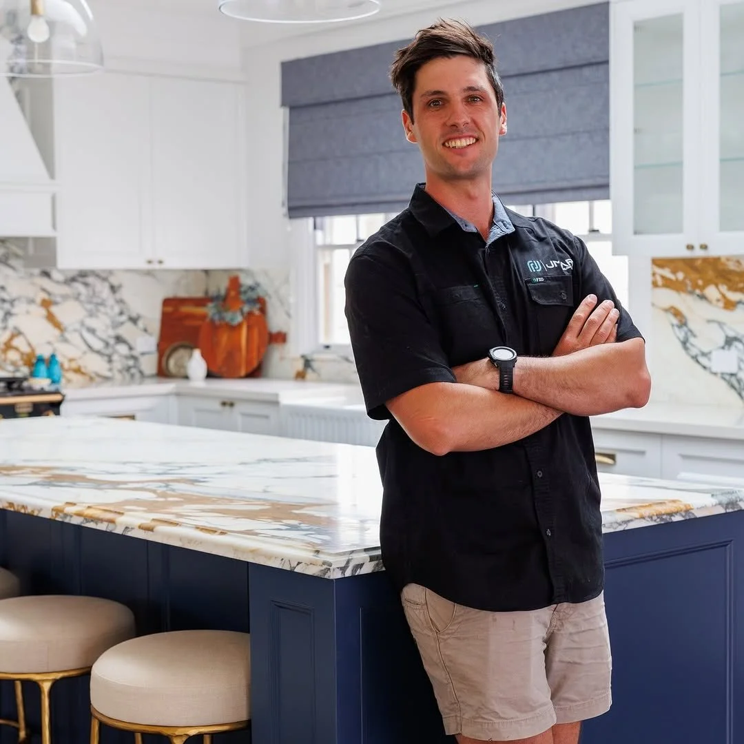 Jayden in a residential custom built kitchen